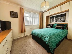 Bedroom One- click for photo gallery